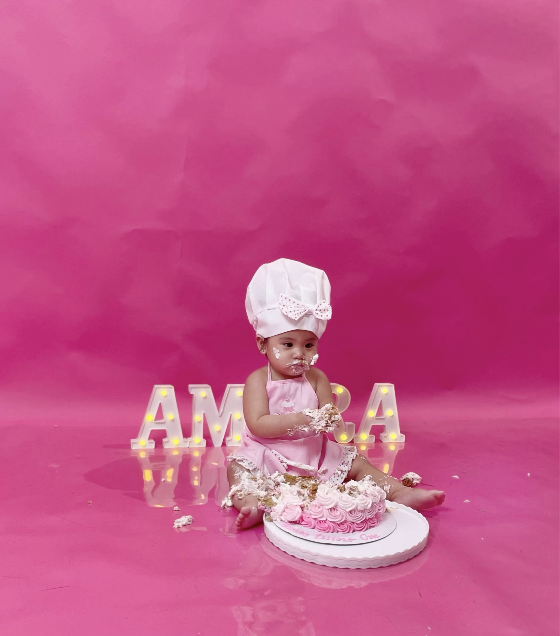 Amara with her first birthday cake
